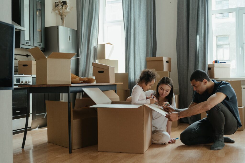 A newly moved-in family unboxing their belongings