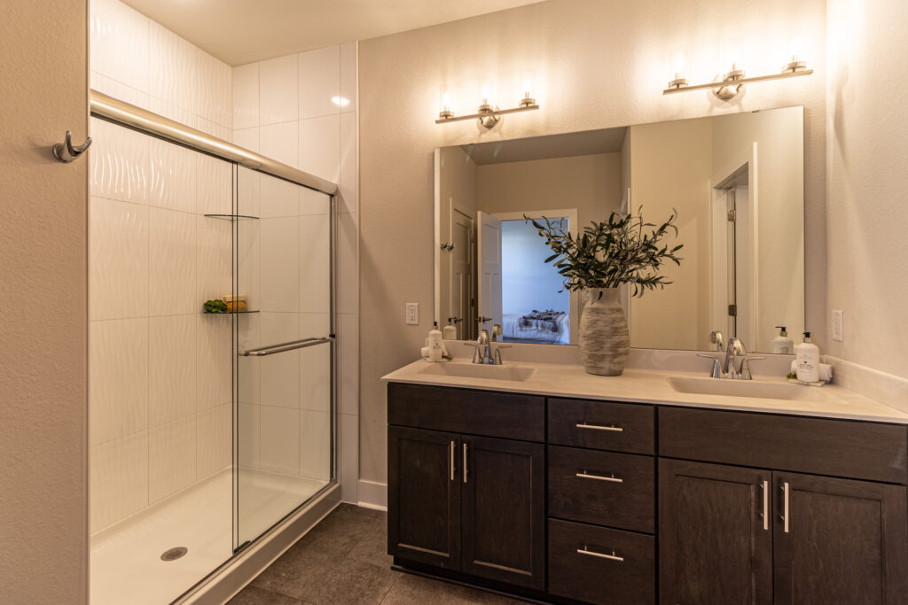 The Celeste Master Bathroom by Stepping Stone Homes Wisconsin