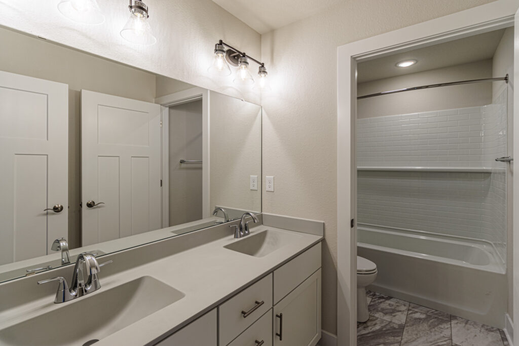 The Clara Bathroom by Stepping Stone Homes