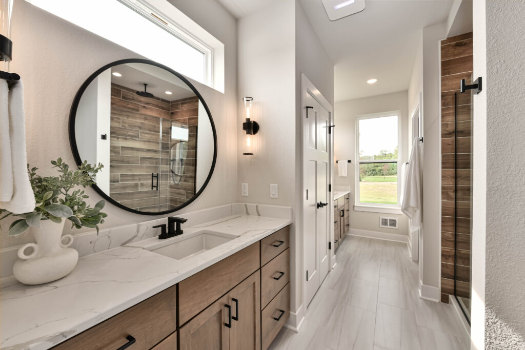 The Elsa Master Bathroom by Stepping Stone Homes