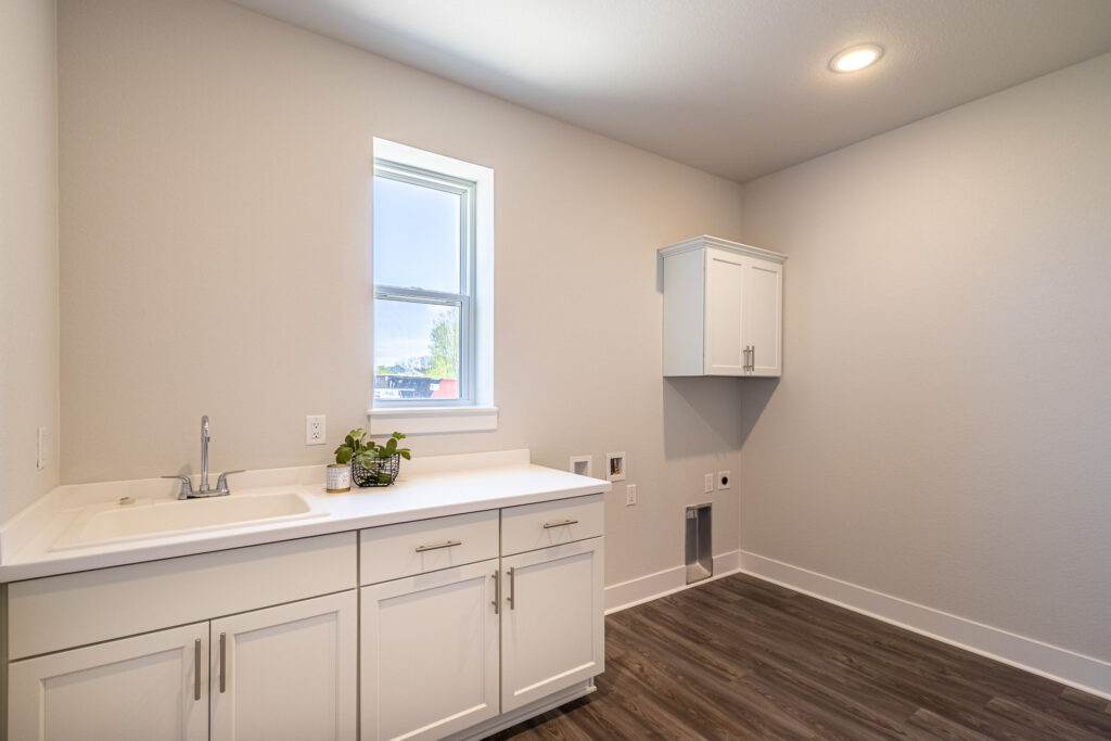 The Monona Laundry Room by Stepping Stone Homes