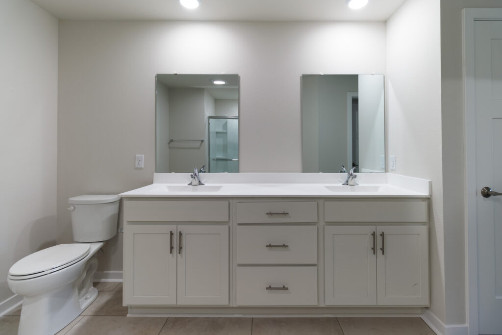 Seven Pines Condo Bathroom by Stepping Stone Homes