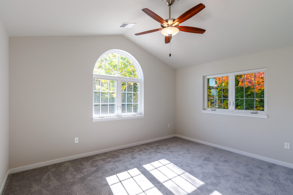 Seven Pines Condo Bedroom by Stepping Stone Homes