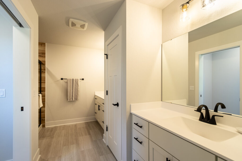 The Julia Master Bathroom by Stepping Stone Homes