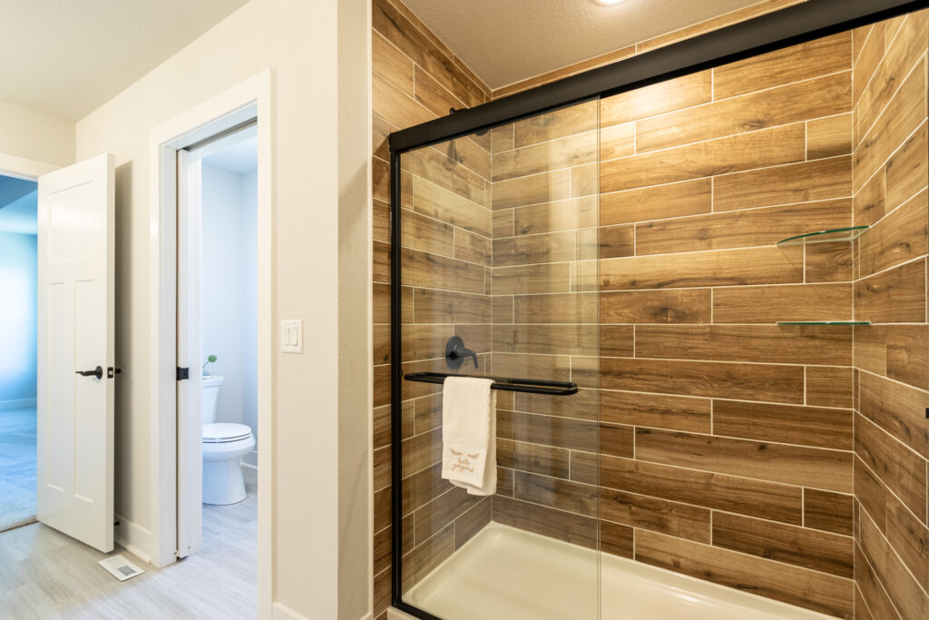 The Julia Master Bathroom by Stepping Stone Homes