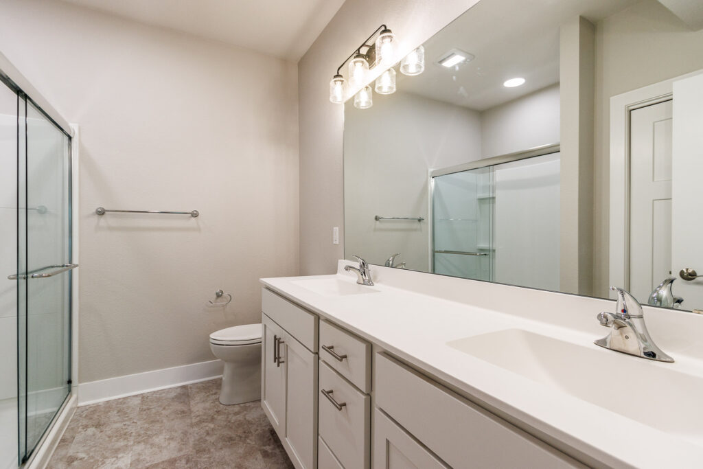 Quiet Meadows Lower Master Bathroom by Stepping Stone Homes