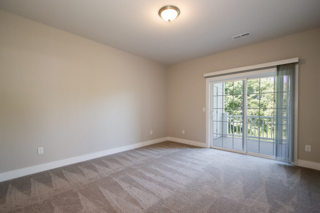 Quiet Meadows Lower Master Bedroom by Stepping Stone Homes