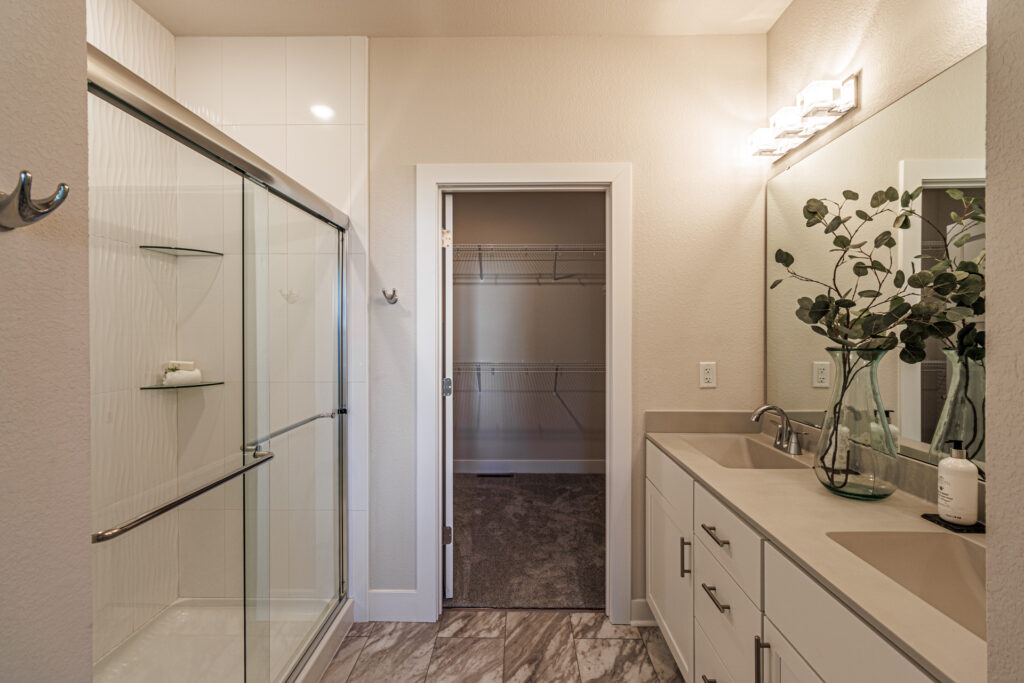 The Eliza Master Bathroom by Stepping Stone Homes