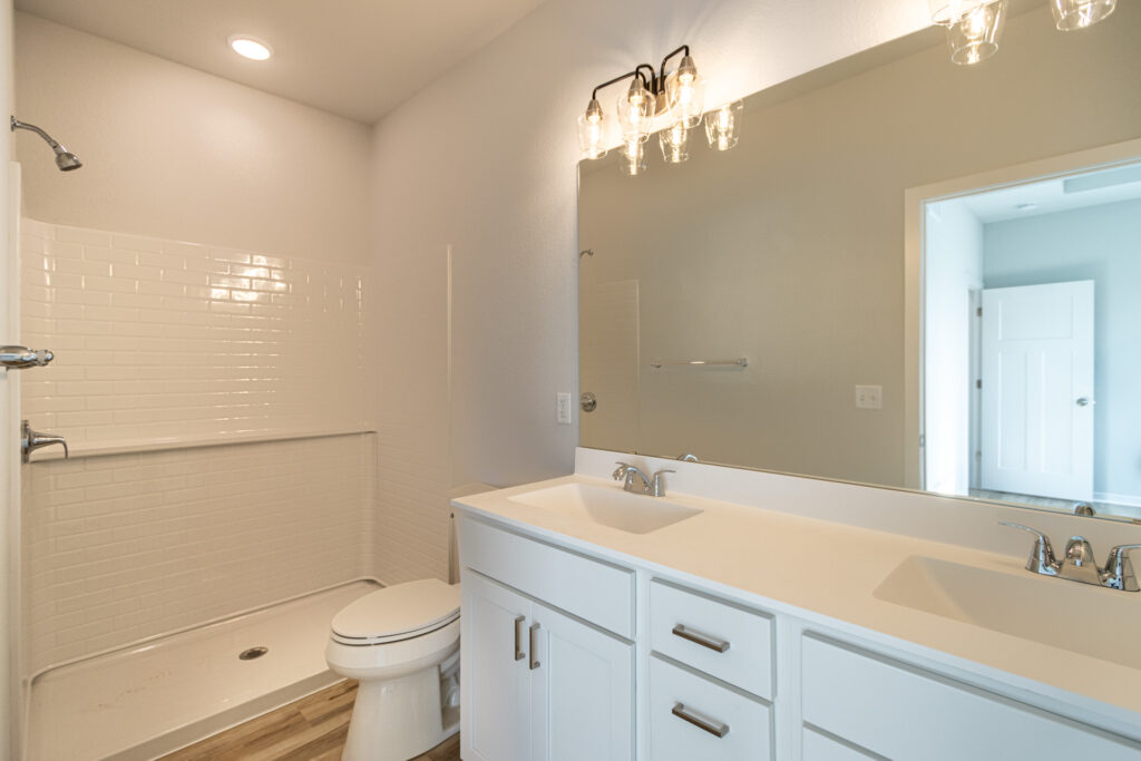 The Ashland Bathroom by Stepping Stone Homes