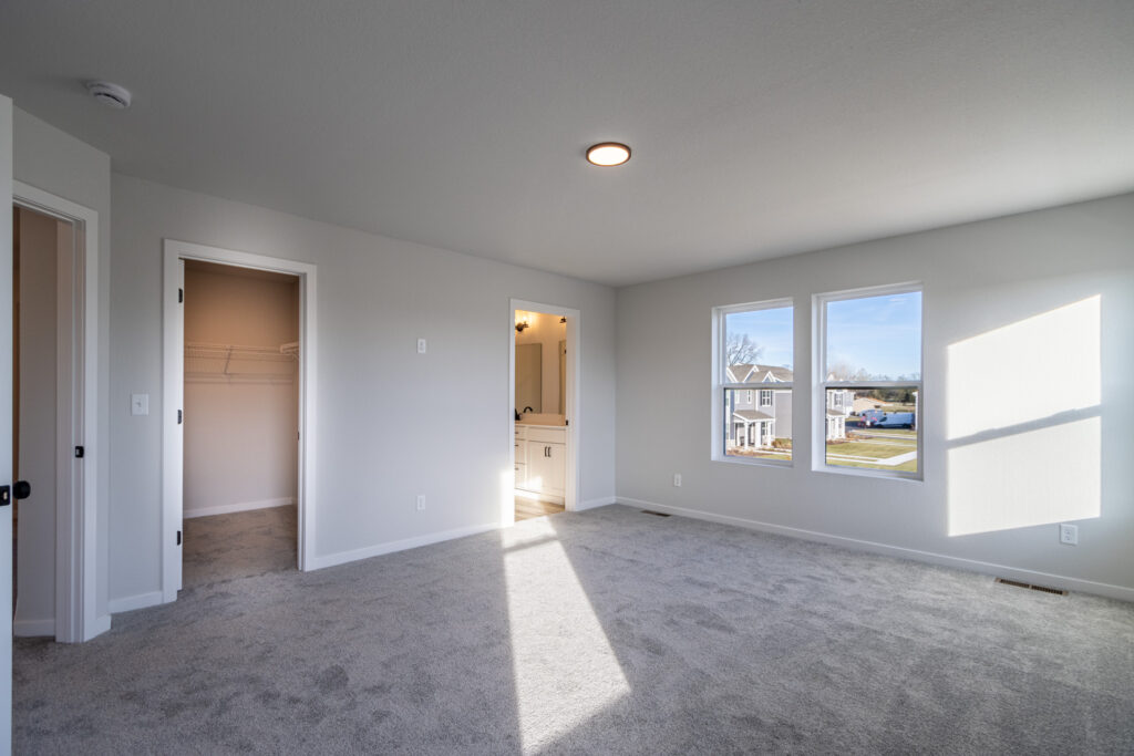 The Prescott Master Bedroom by Stepping Stone Homes Wisconsin