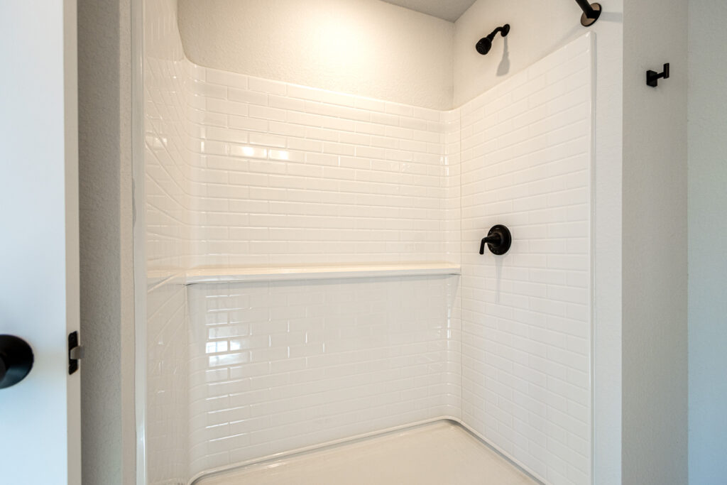 The Prescott Master Bathroom Shower by Stepping Stone Homes Wisconsin