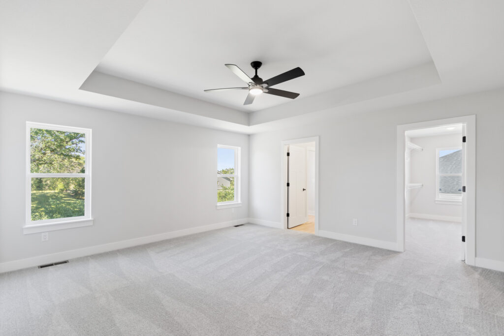 The Julia Master Bedroom by Stepping Stone Homes