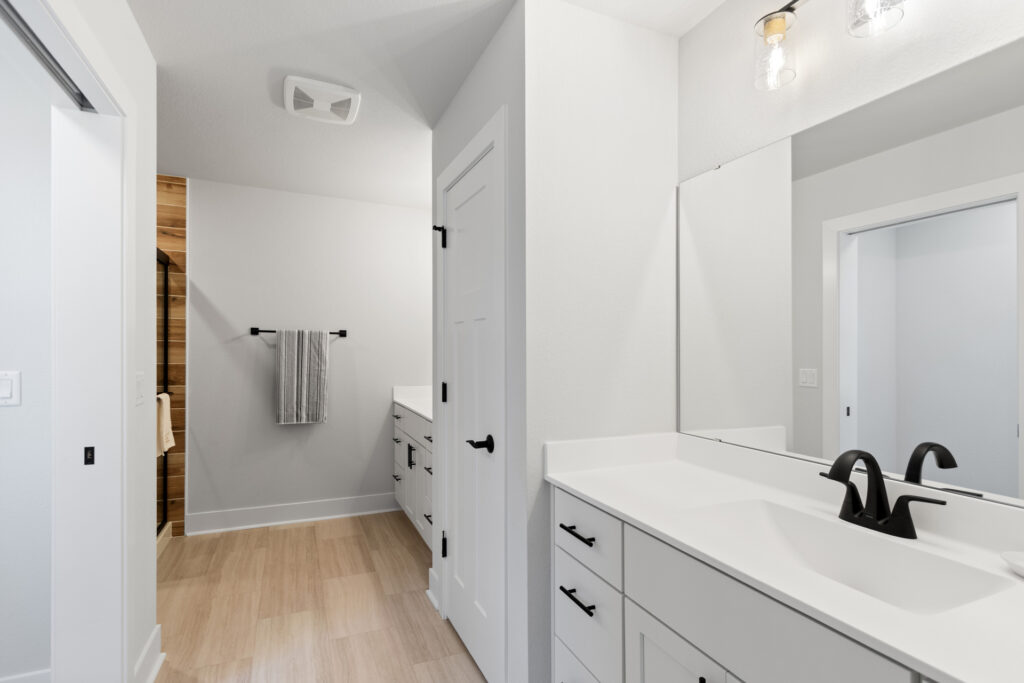 The Julia Master Bathroom by Stepping Stone Homes