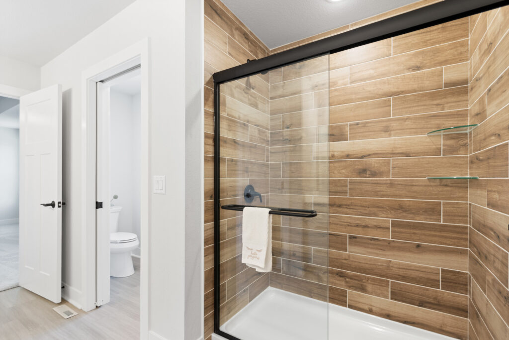 The Julia Master Bathroom by Stepping Stone Homes