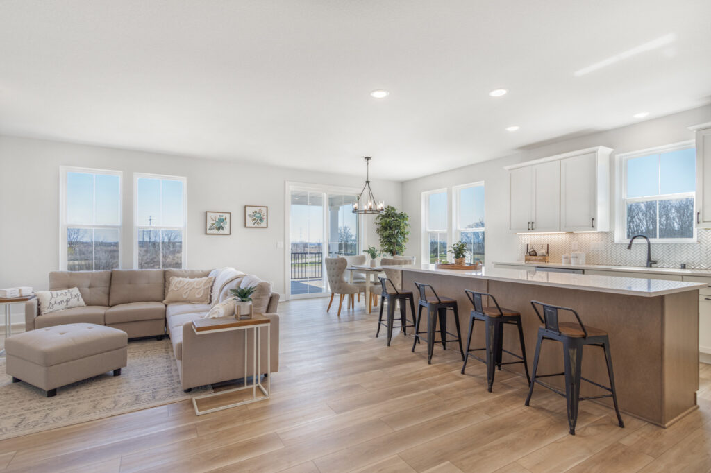 The Juniper Duplex Great Room by Stepping Stone Homes