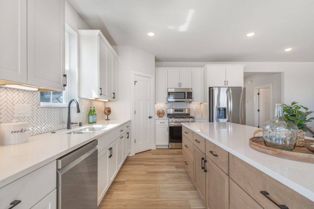 The Juniper Duplex Kitchen by Stepping Stone Homes