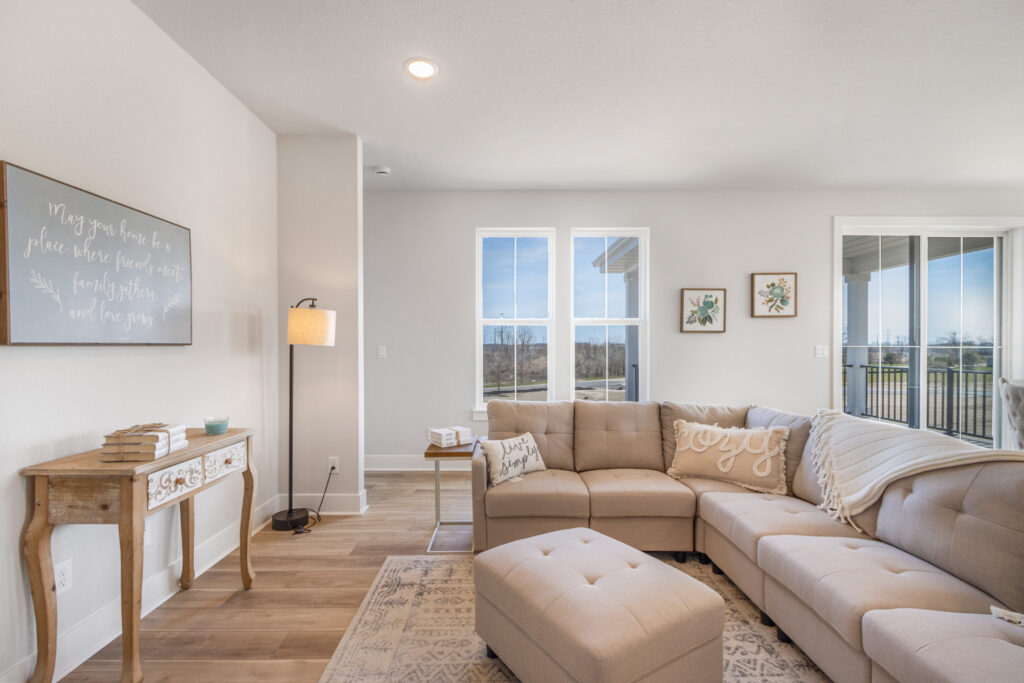 The Juniper Duplex Living Room by Stepping Stone Homes