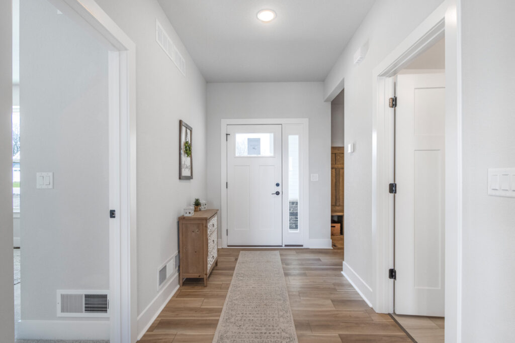 The Juniper Duplex Foyer by Stepping Stone Homes