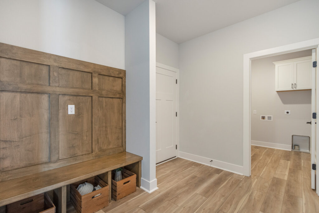 The Juniper Duplex Mud Room by Stepping Stone Homes