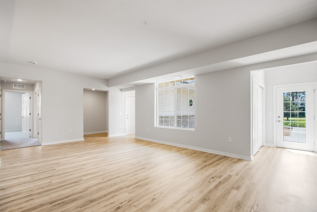 Edgewood Meadows Lower Condo Great Room by Stepping Stone Homes