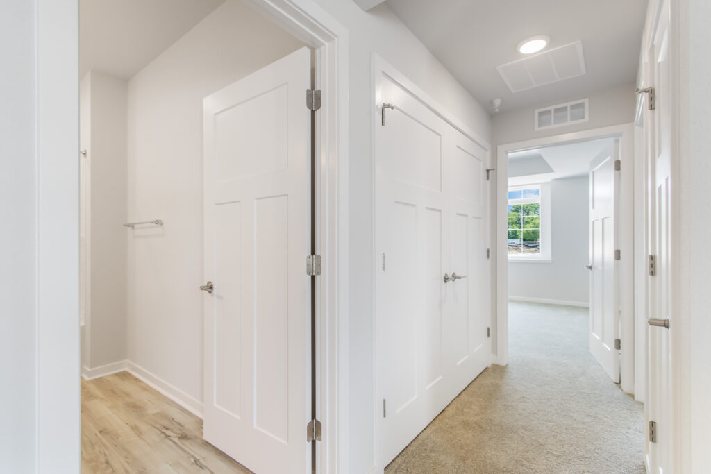 Edgewood Meadows Lower Condo Hallway by Stepping Stone Homes