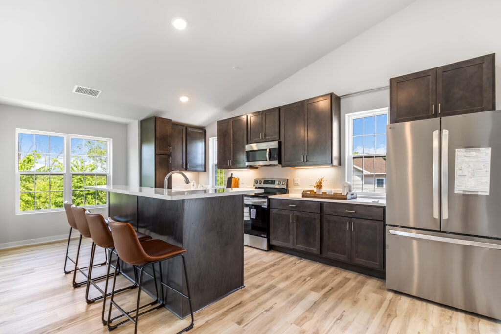 The Seven Pines Condo Kitchen by Stepping Stone Homes
