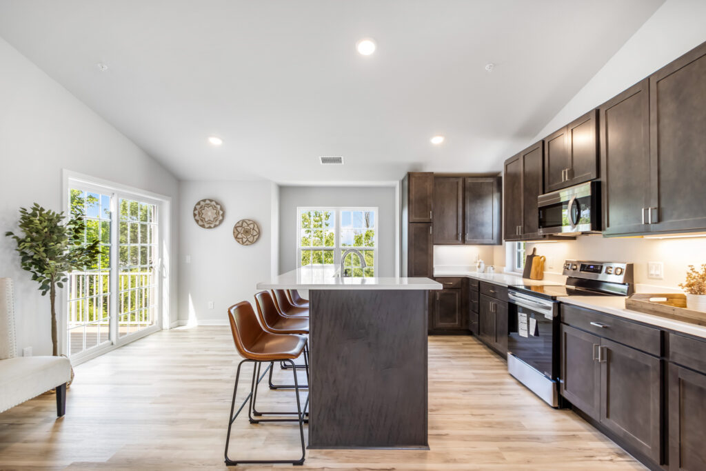 The Seven Pines Condo Kitchen by Stepping Stone Homes