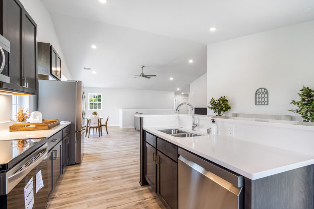 The Seven Pines Condo Kitchen by Stepping Stone Homes