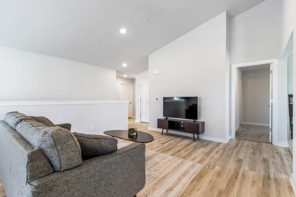Seven Pines Condo Living Room by Stepping Stone Homes