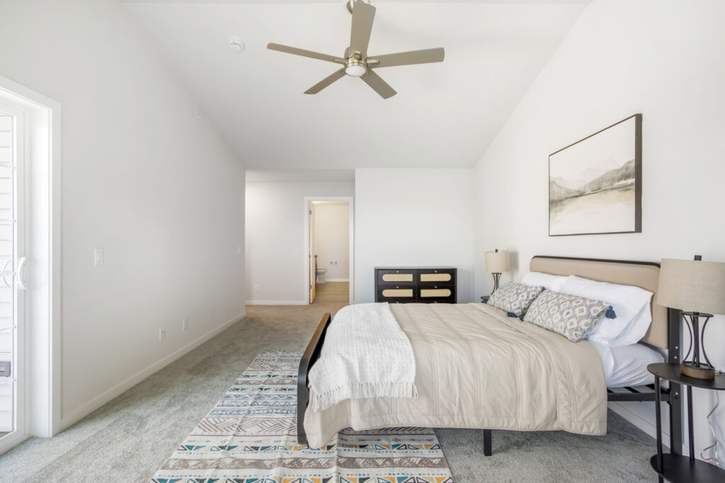 Seven Pines Condo Master Bedroom by Stepping Stone Homes