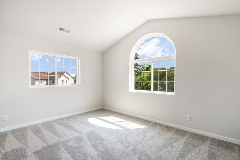 Seven Pines Condo Bedroom by Stepping Stone Homes