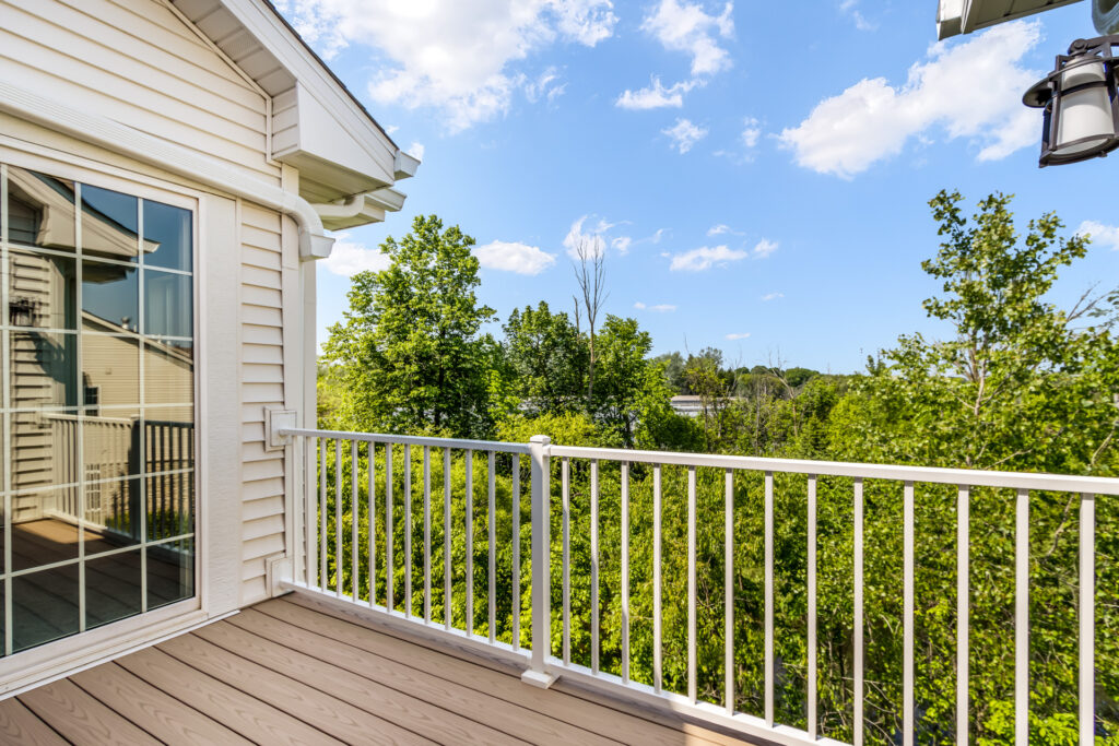 The Seven Pines Condo Deck by Stepping Stone Homes