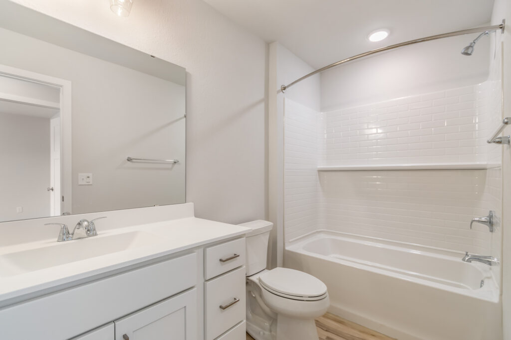 The Cypress Bathroom by Stepping Stone Homes