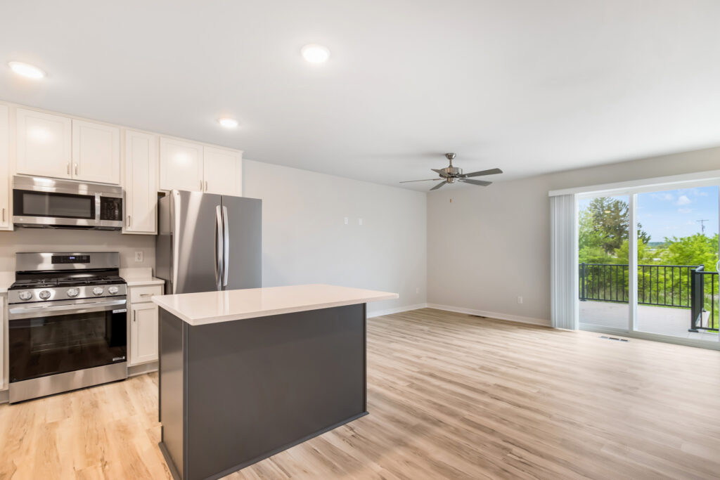 The Pine Great Room by Stepping Stone Homes