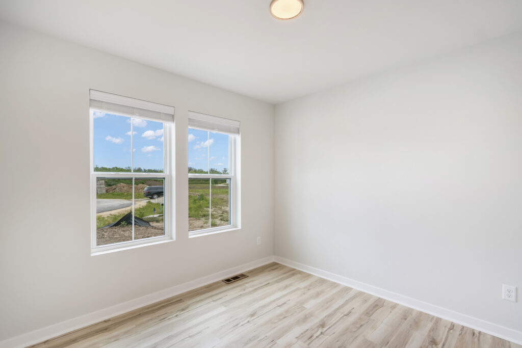 The Pine Bedroom by Stepping Stone Homes
