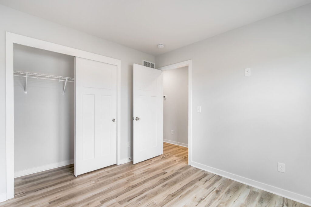 The Pine Bedroom by Stepping Stone Homes