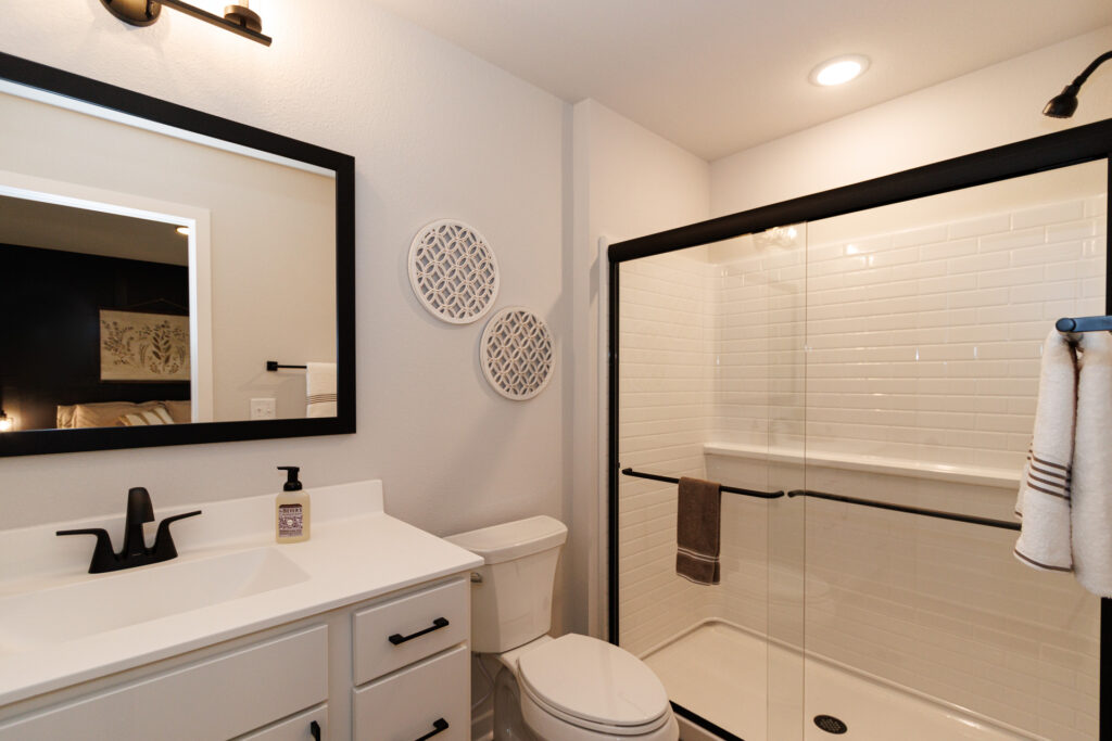The Linden Master Bathroom by Stepping Stone Homes