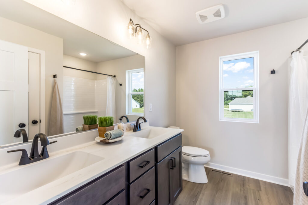 The Geneva Master Bathroom by Stepping Stone Homes