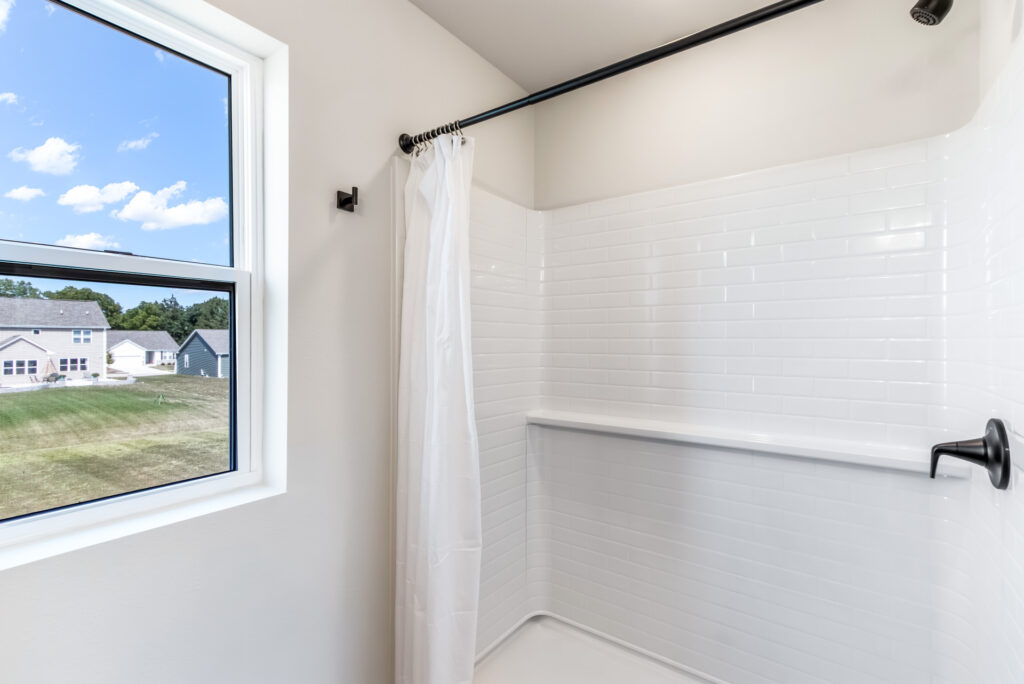 The Geneva Master Bathoom by Stepping Stone Homes