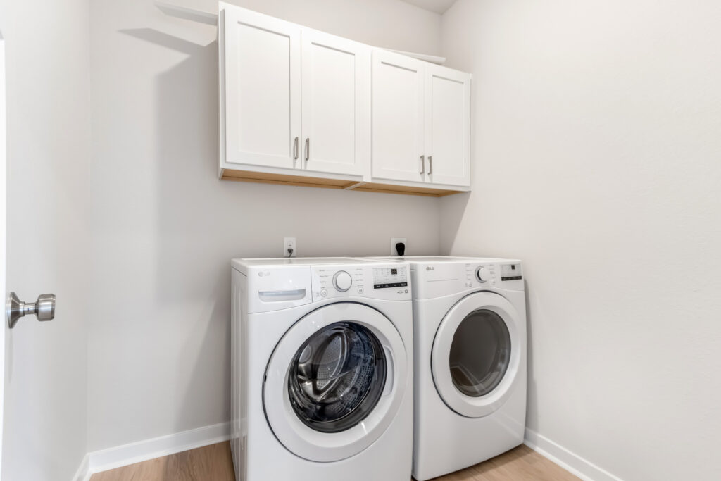 The Ashland Laundry Room by Stepping Stone Homes