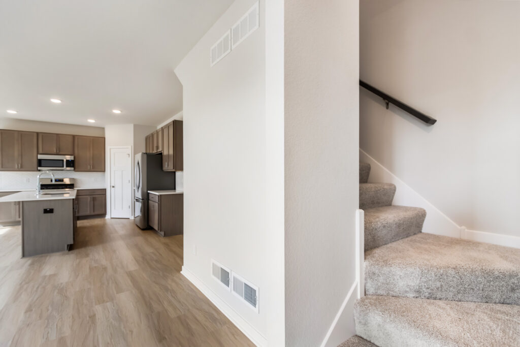 The Madison 2nd Story Stairs by Stepping Stone Homes
