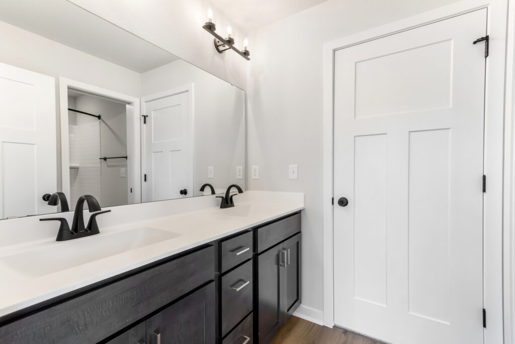 The Prescott Bathroom by Stepping Stone Homes WI