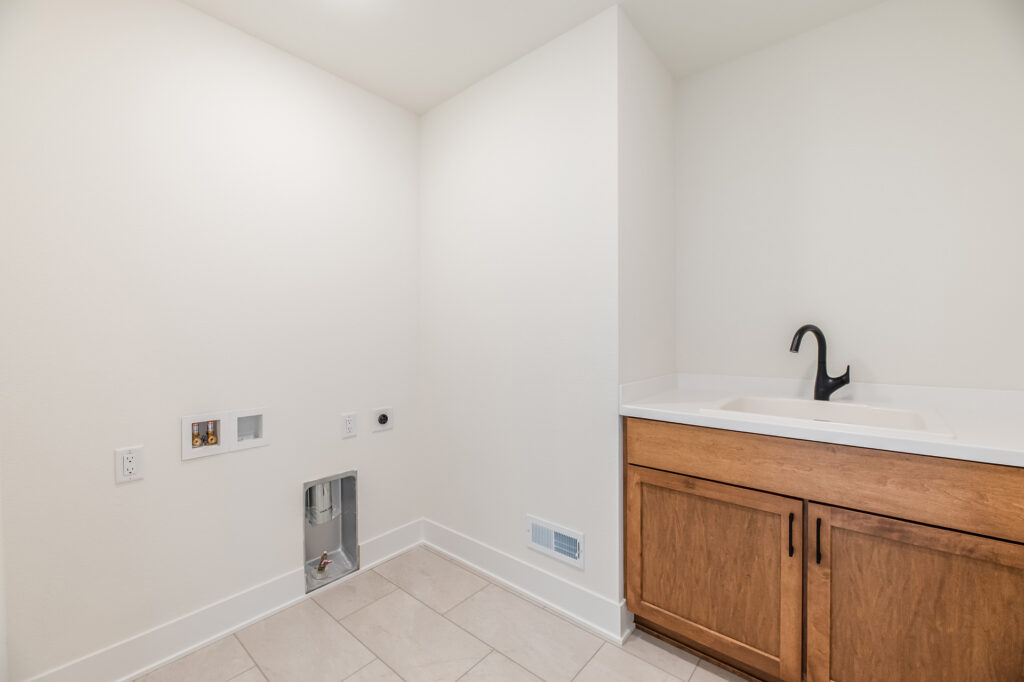 The Berkshire Laundry Room by Stepping Stone Homes