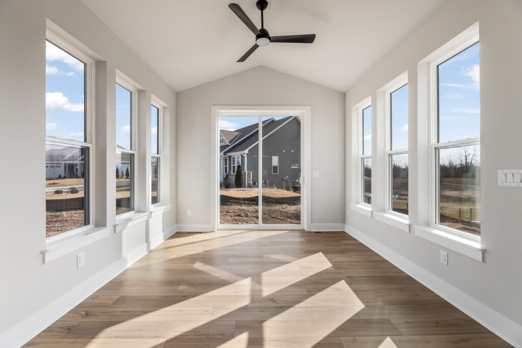 The Riley Model Home Sun Room by Stepping Stone Homes