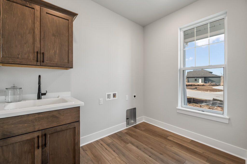 The Riley Model Home Laundry Room by Stepping Stone Homes