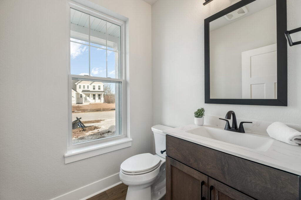 The Riley Model Home Bathroom by Stepping Stone Homes