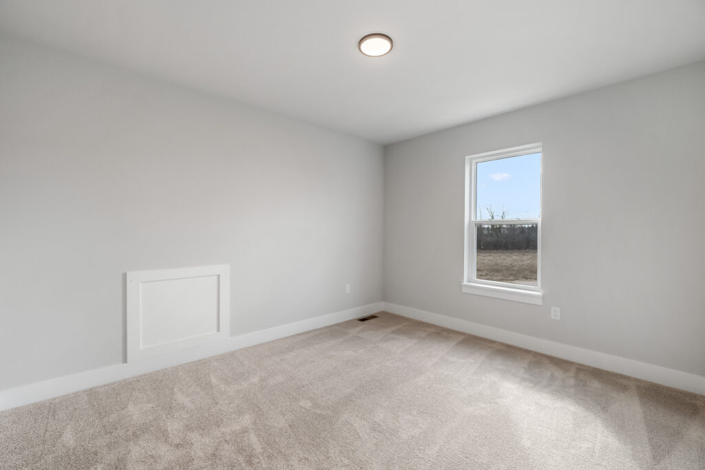 The Riley Model Home Bedroom by Stepping Stone Homes