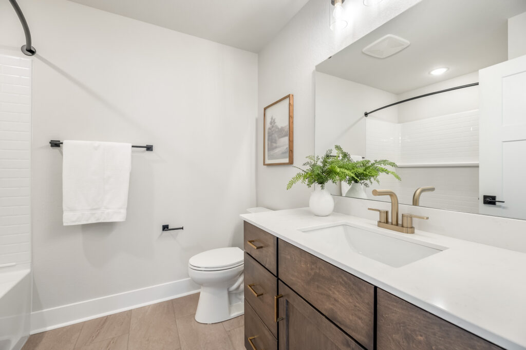 The Julia Bathroom by Stepping Stone Homes WI