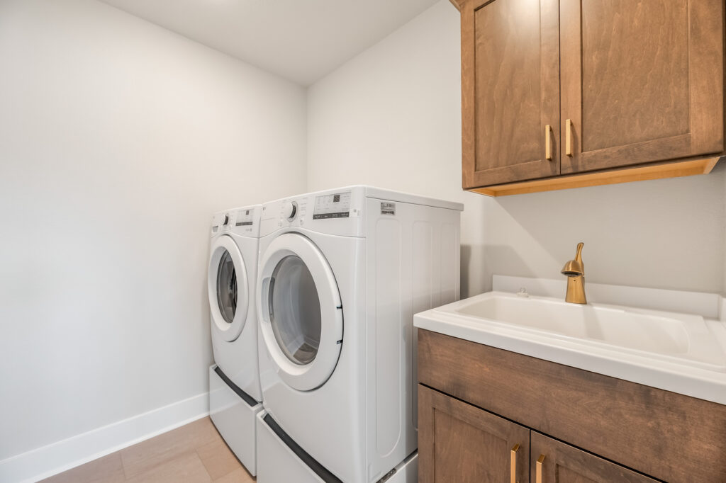 The Julia Laundry Room by Stepping Stone Homes WI