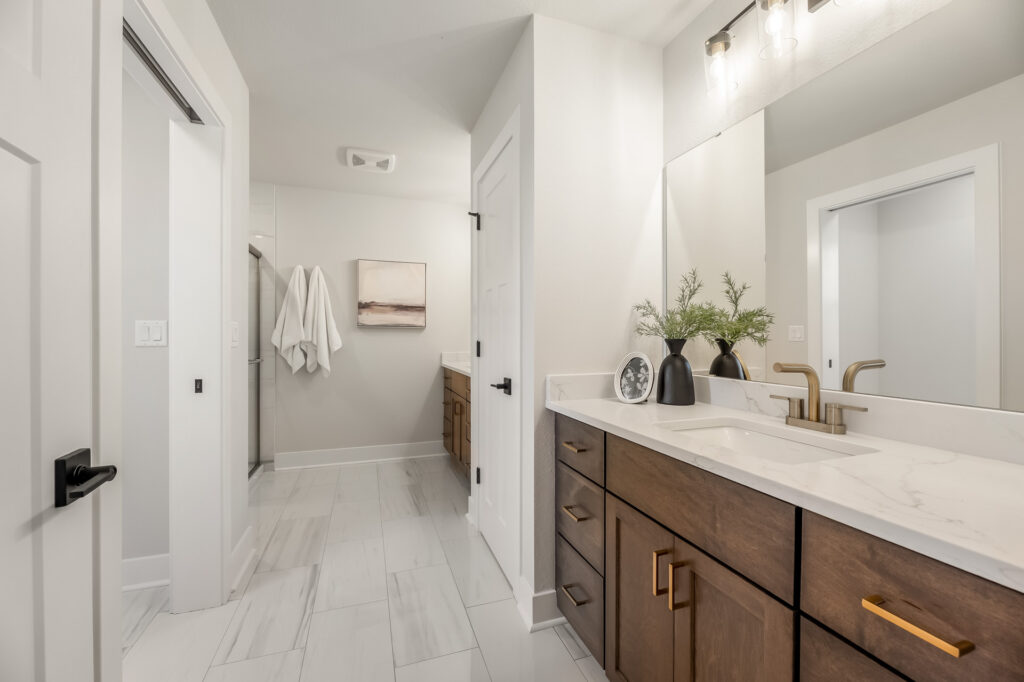 The Julia Master Bathroom by Stepping Stone Homes WI